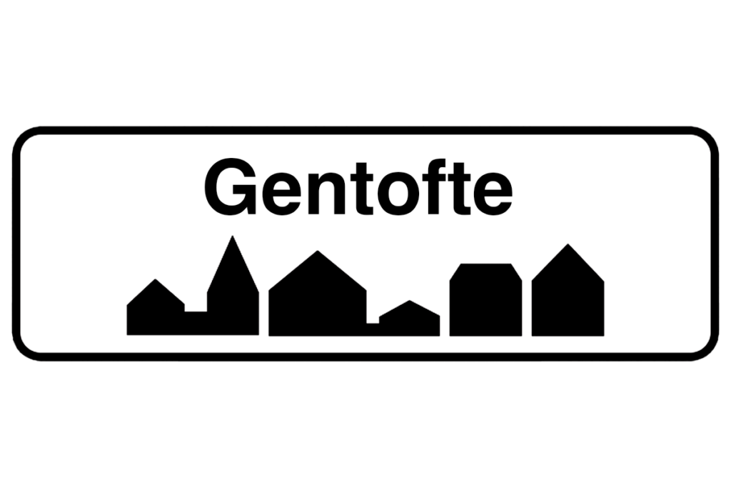 Byskilt med teksten "Gentofte" i fokus, der fremhæver bynavnet og understøtter vores malerfirma i Gentofte.