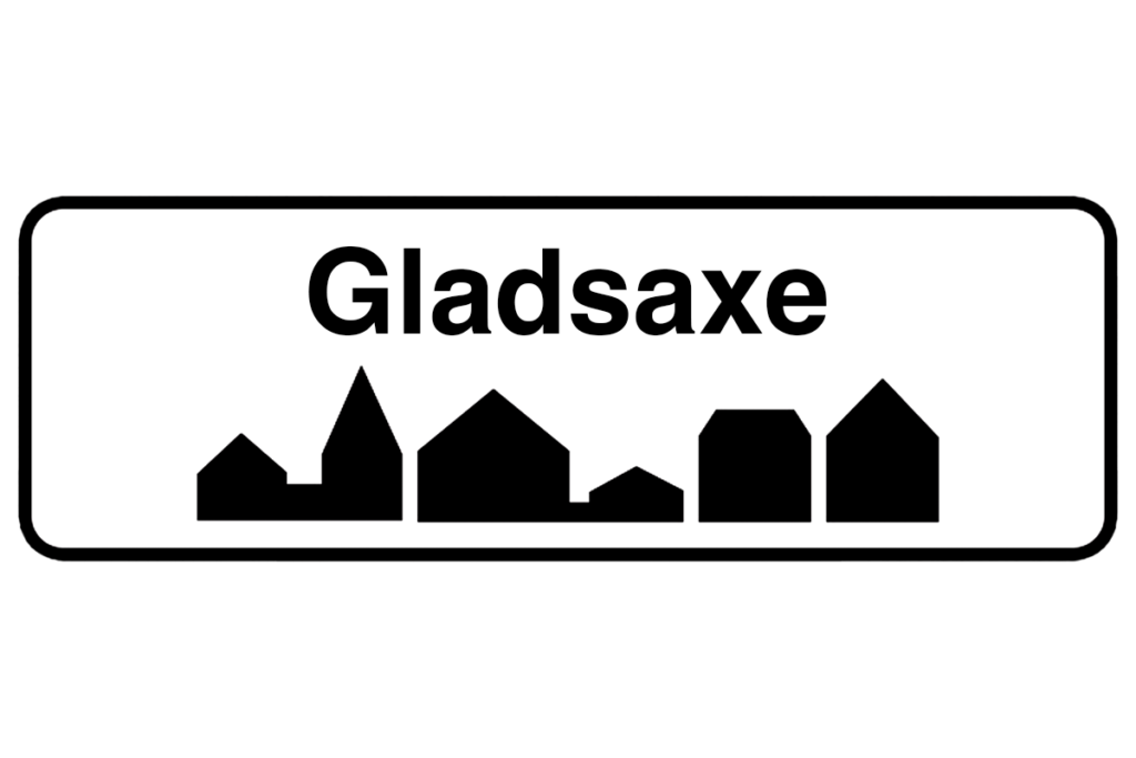 Byskilt med teksten "Gladsaxe" i fokus, der fremhæver bynavnet og understøtter vores malerfirma i Gladsaxe.